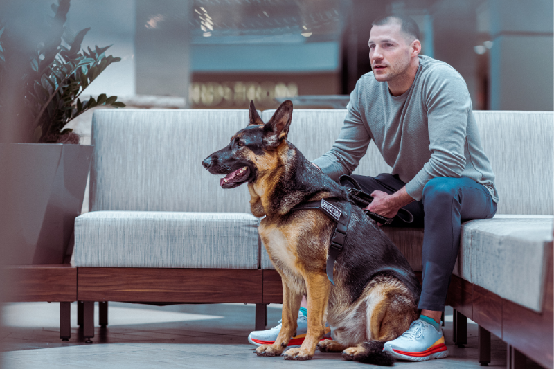 NDIS Participant with a dog in recovery from PTSD